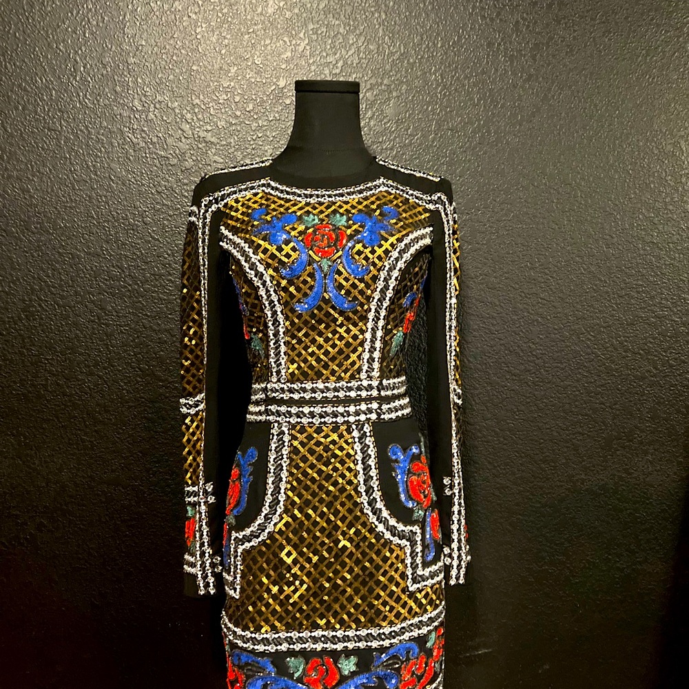 Hand sewn beaded dress by Bebe, size 2.